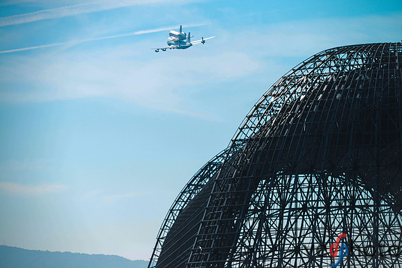 Space Shuttle Endeavour clearing the NASA Ames hangar