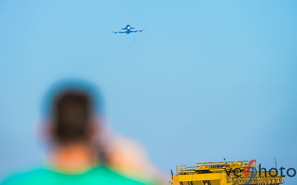 A NASA Ames employee snaps a pic of the Space Shuttle Endeavour Flyover